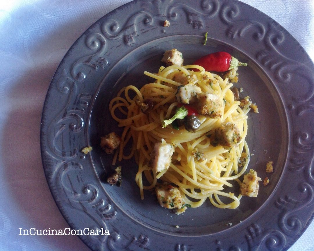 Spaghetti con bocconcini di pesce spada impanato