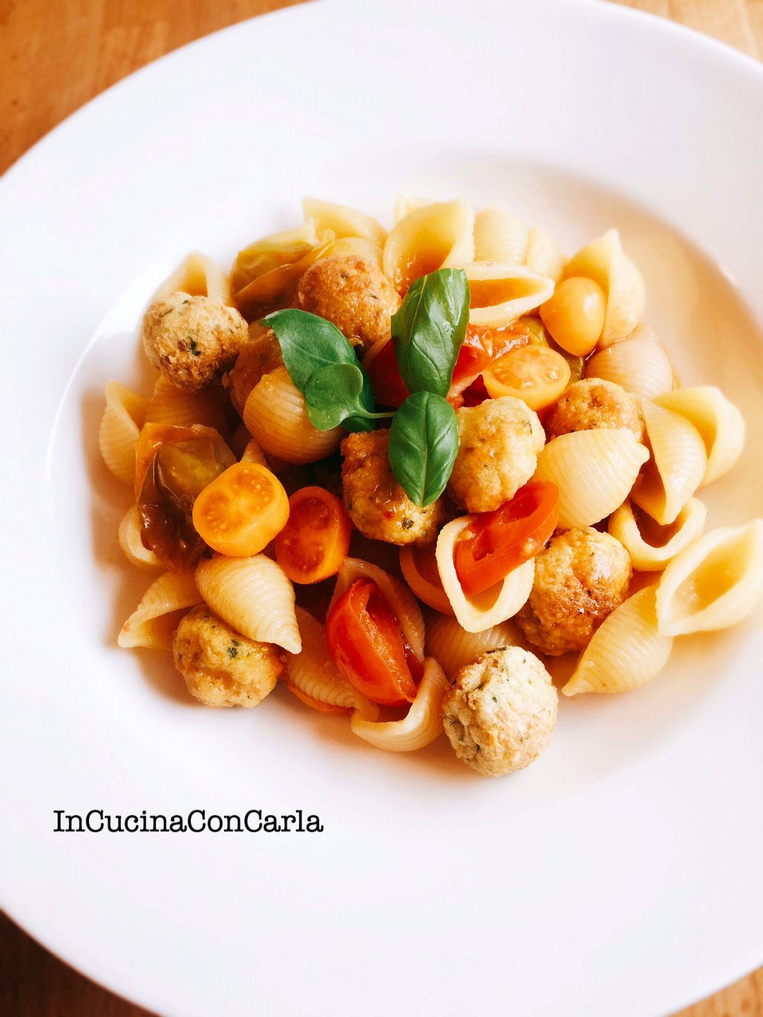 Gnocchi con pomodorini e polpettine di merluzzo