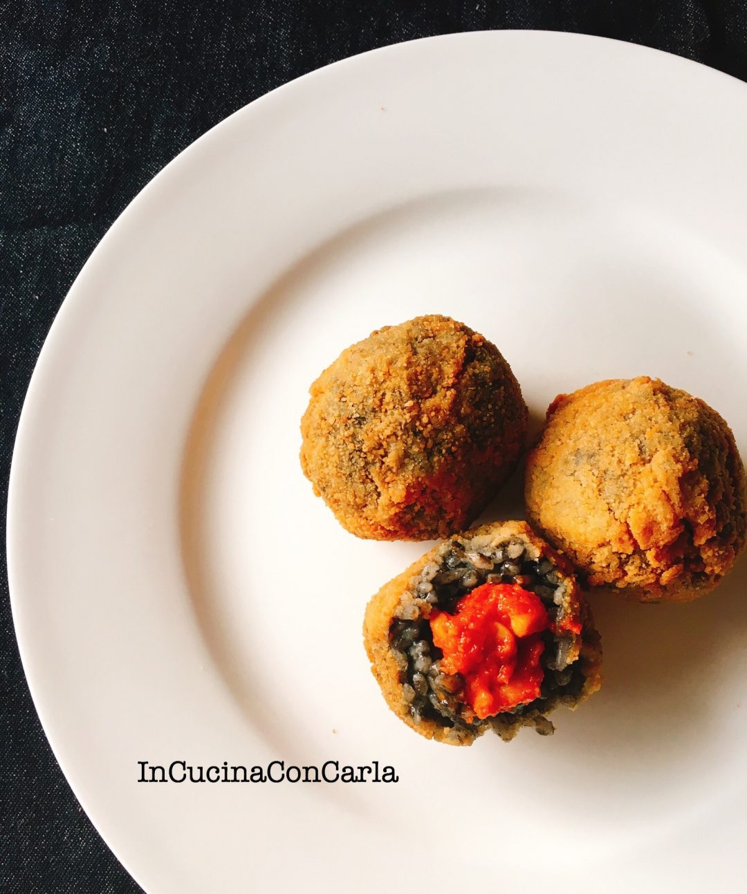 Arancine al nero di seppia