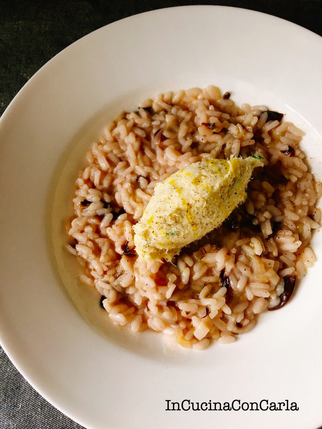 Risotto al radicchio con baccalà mantecato