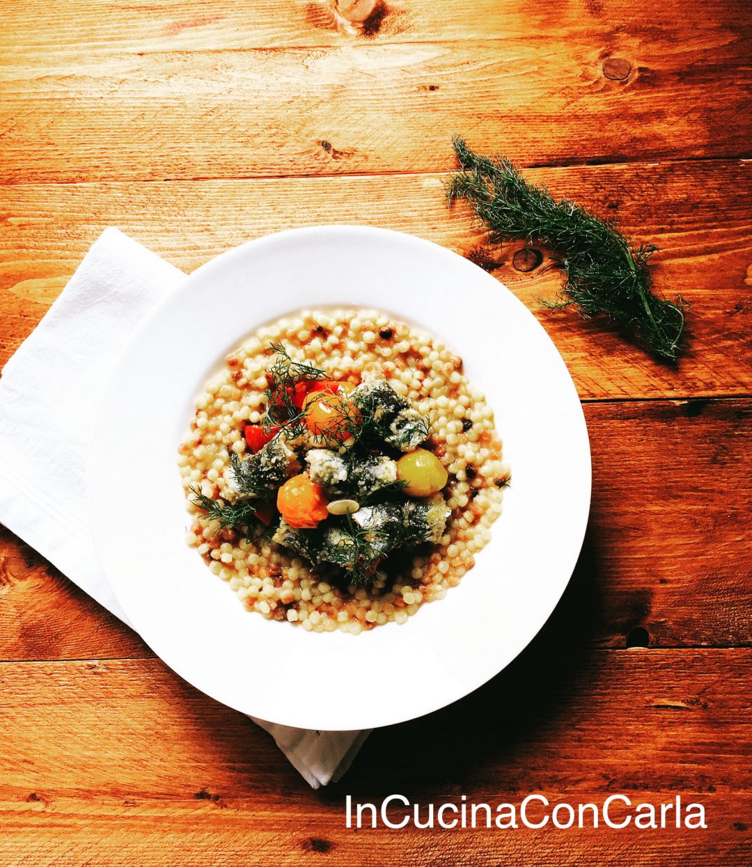 Fregola risottata con involtini di sarde